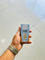 بسته‌بندی آبی و نارنجی ضدآفتاب فیوژن واتر مجیک ایزدین SPF50 حجم ۵۰ میل